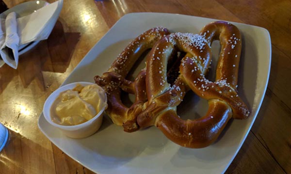Green Bay Distillery's pretzel with cheese appetizer.